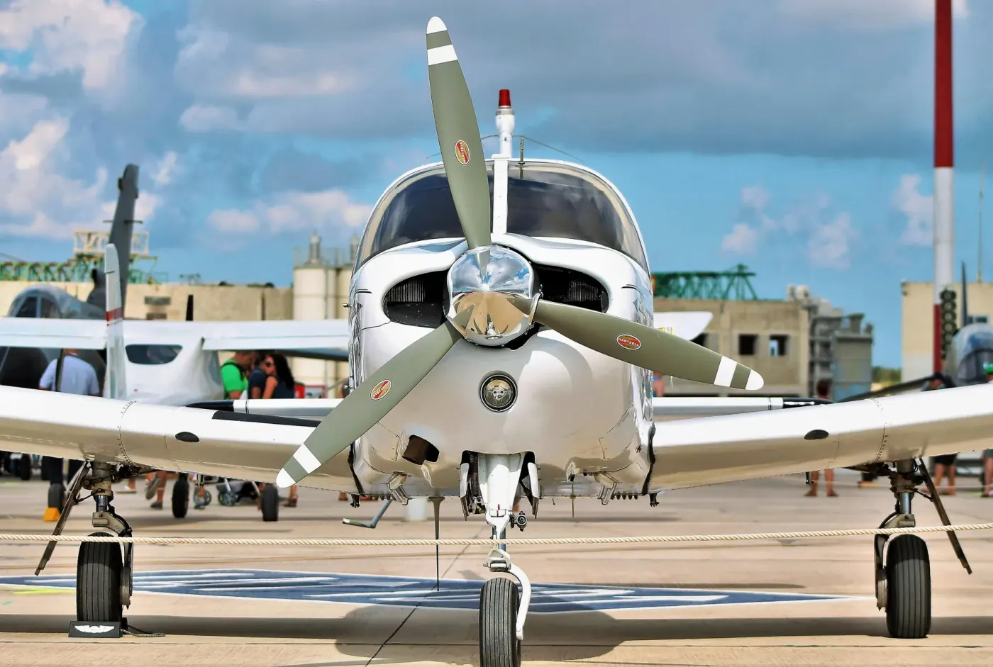 Single-engine propeller aircraft on an apron for aviation marketplace listings